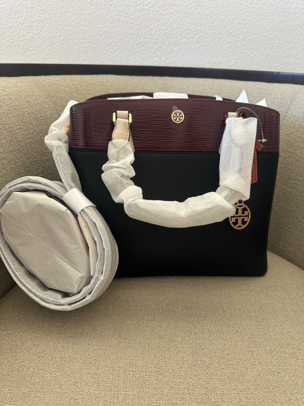 NWT Tory Burch Black and Burgundy Satchel with Tan Handles and Orange Charm - Picture 11 of 12